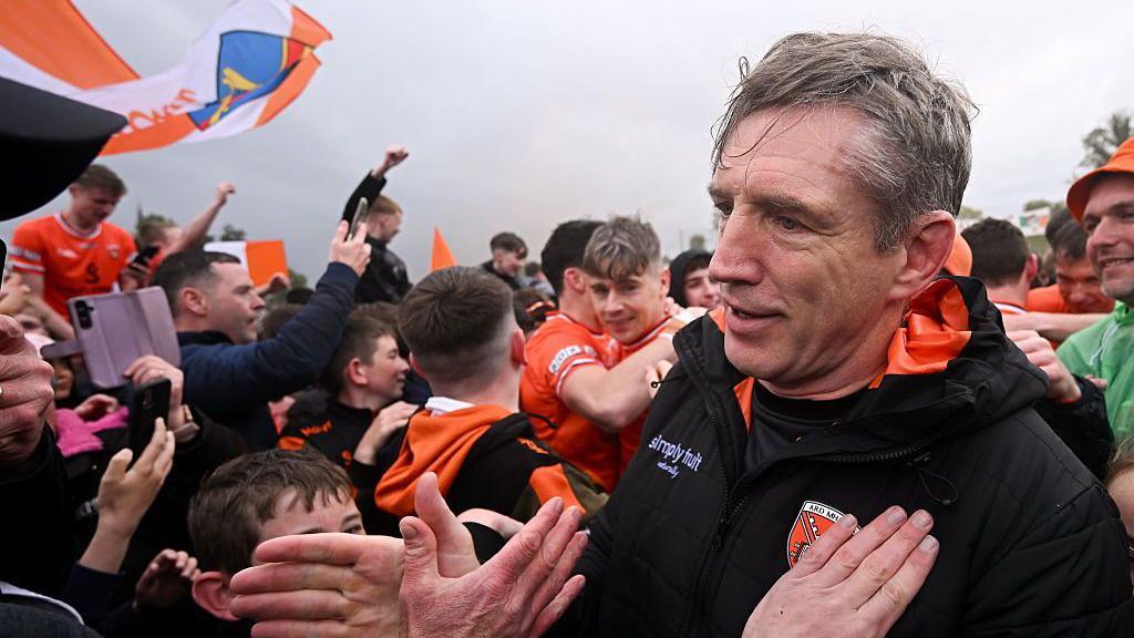 Kieran McGenney celebrates with Armagh fans