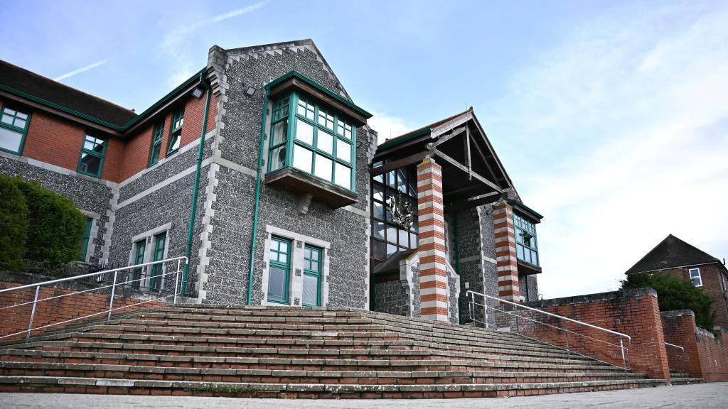 A grey building. 