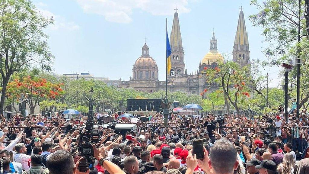 Fans media surrounding Saul 'Canelo' Alvarez's car following the weigh-in