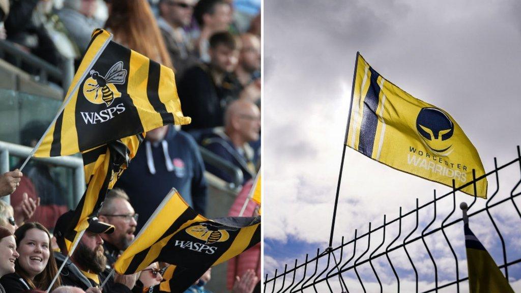 Flags bearing Worcester Warriors and Wasps' club crests