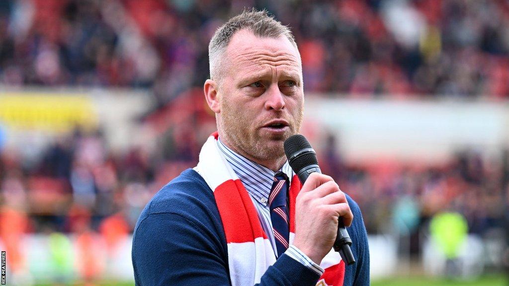 Michael Flynn addresses Swindon's County Ground