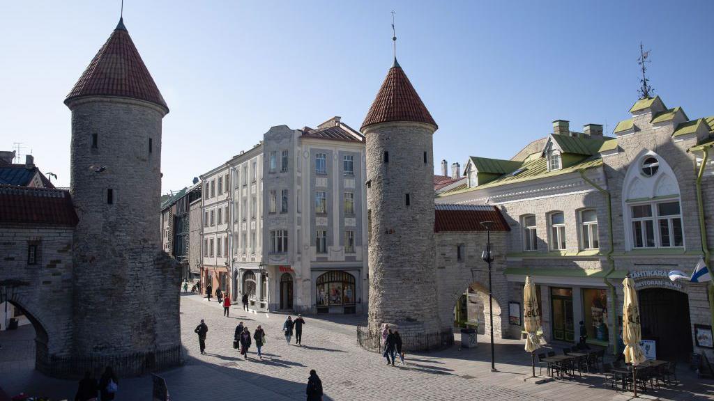 Twin towers mark the entrance to the old town of Tallin, Estonia