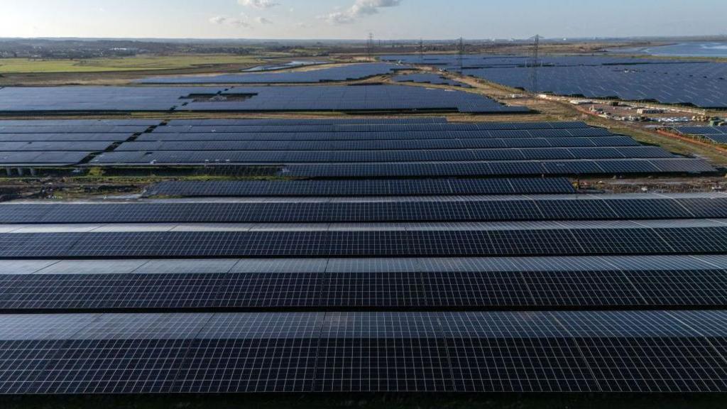An aerial view of an area of rows of solar panels on Cleve Hill solar park on November 26, 2024 in Faversham.