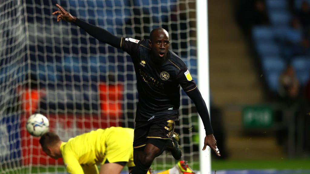 Albert Adomah celebrates scoring for Queens Park Rangers