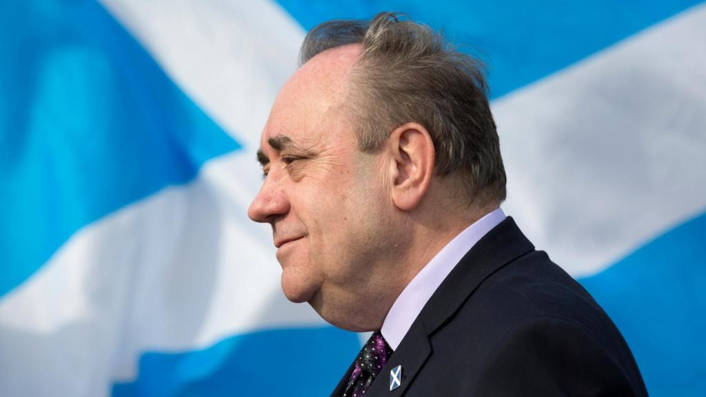 Alex Salmond in front of a saltire