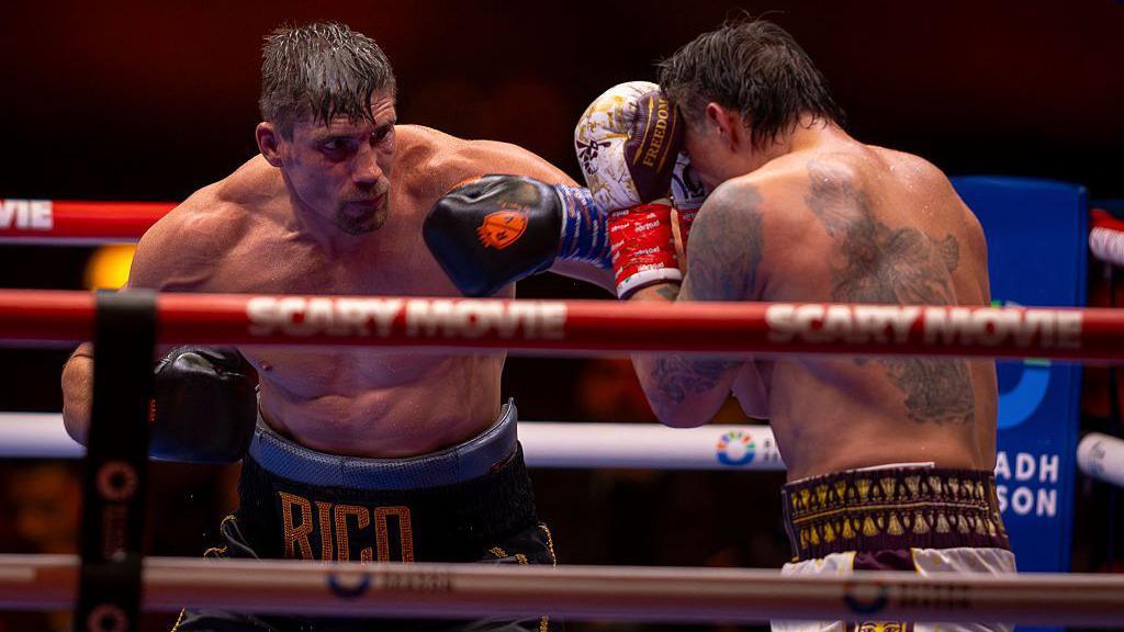 Rico Verhoeven prepares to punch Oleksandr Usyk