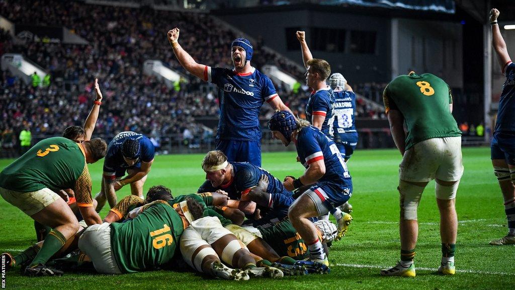 Bristol players celebrate Yann Thomas' try against South Africa