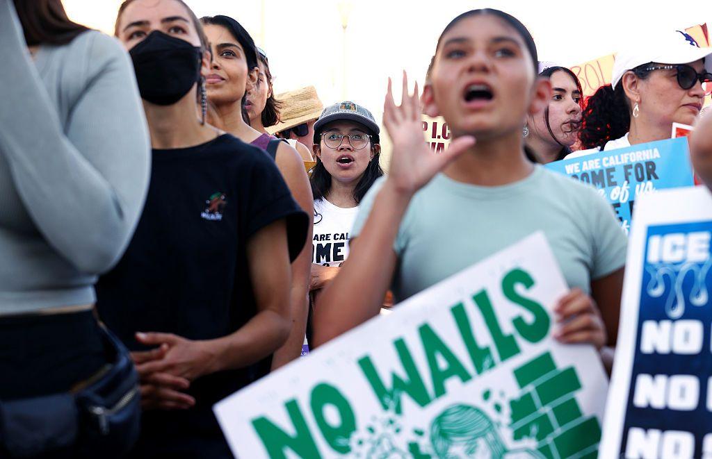 People protest against immigration raids earlier this month.