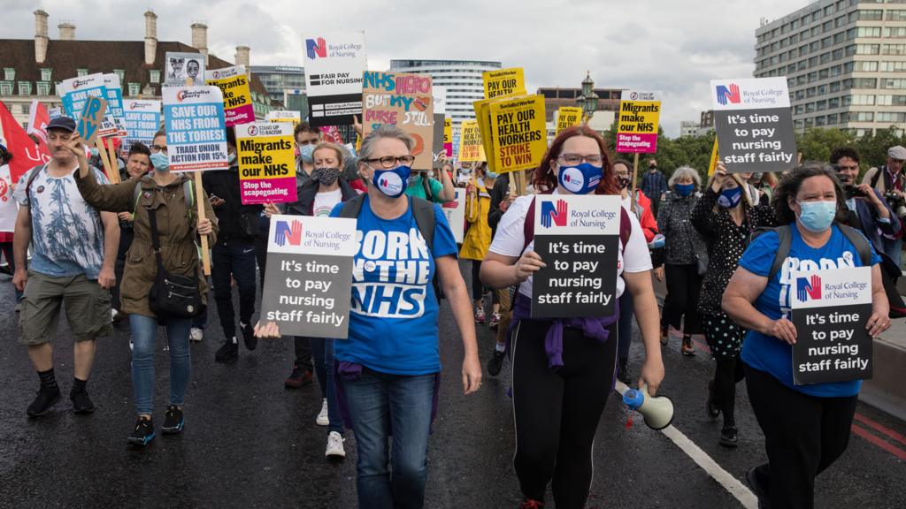 NHS staff march from St Thomas' Hospital to Downing Street