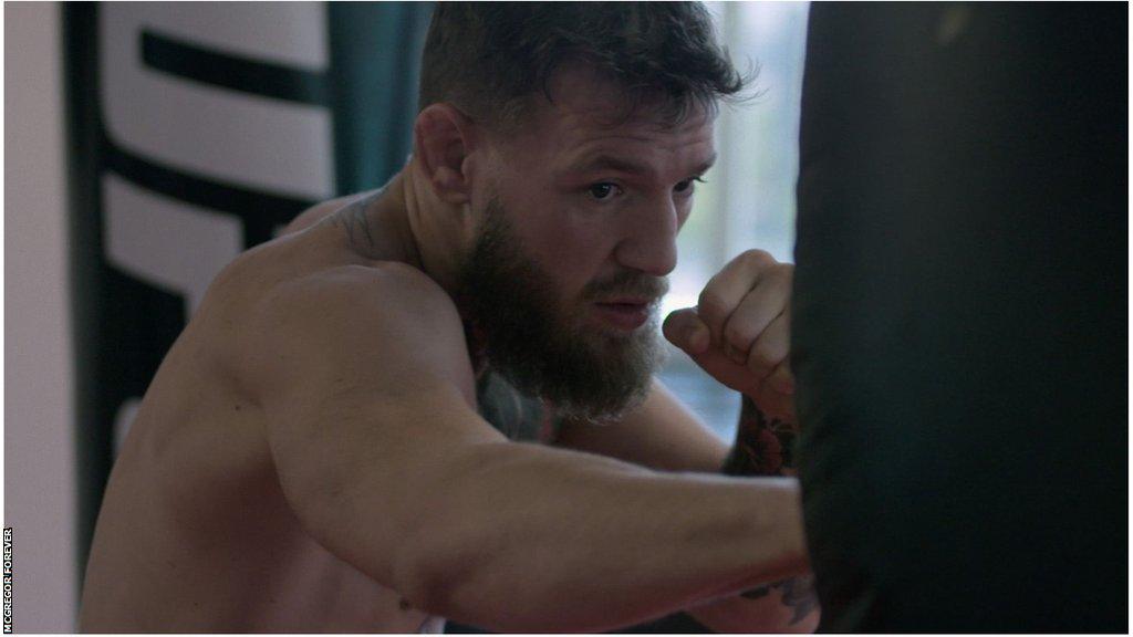 Conor McGregor trains with punch bag