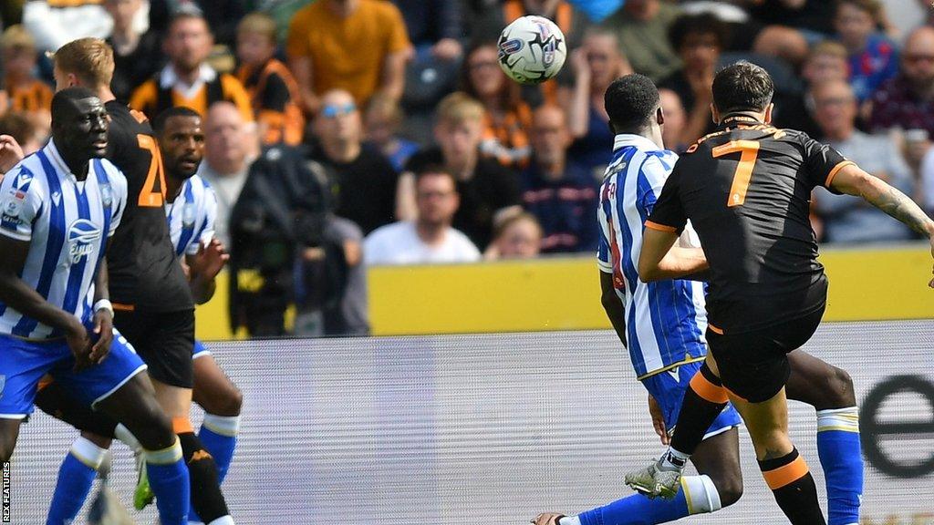 Ozan Tufan (right) scores for Hull City