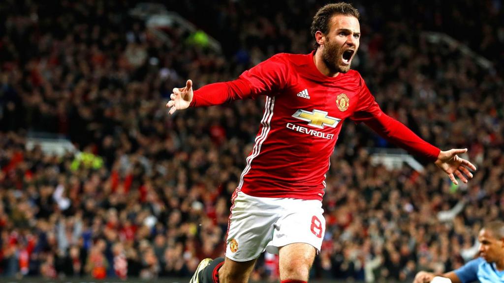 Juan Mata celebrates