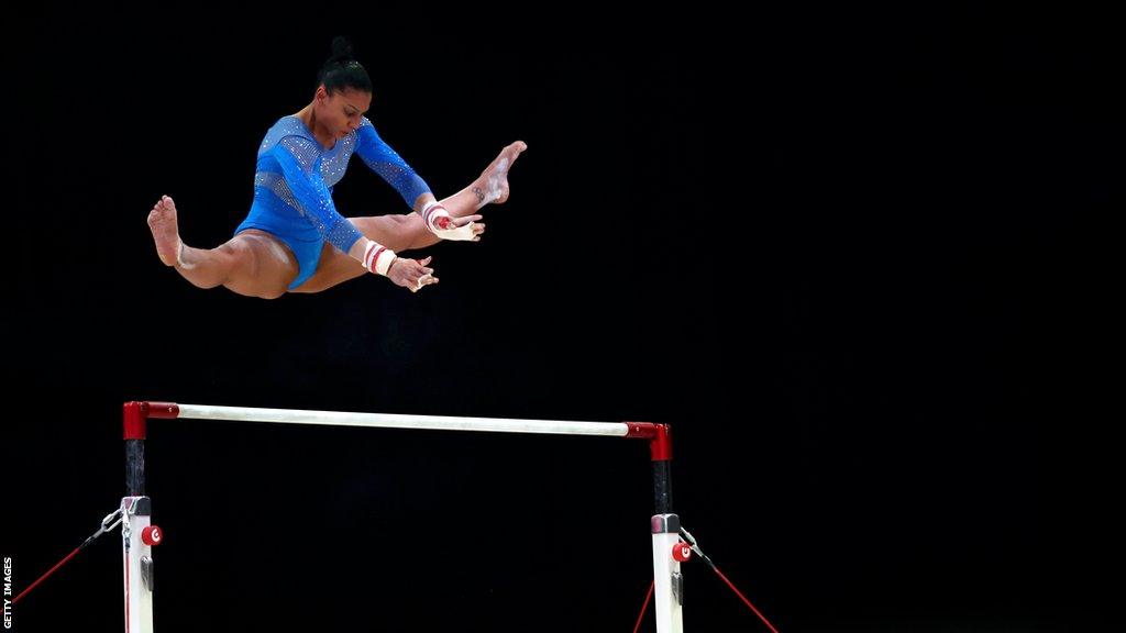 British gymnast Becky Downie performing on bars