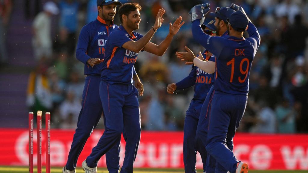 India players celebrate taking a wicket