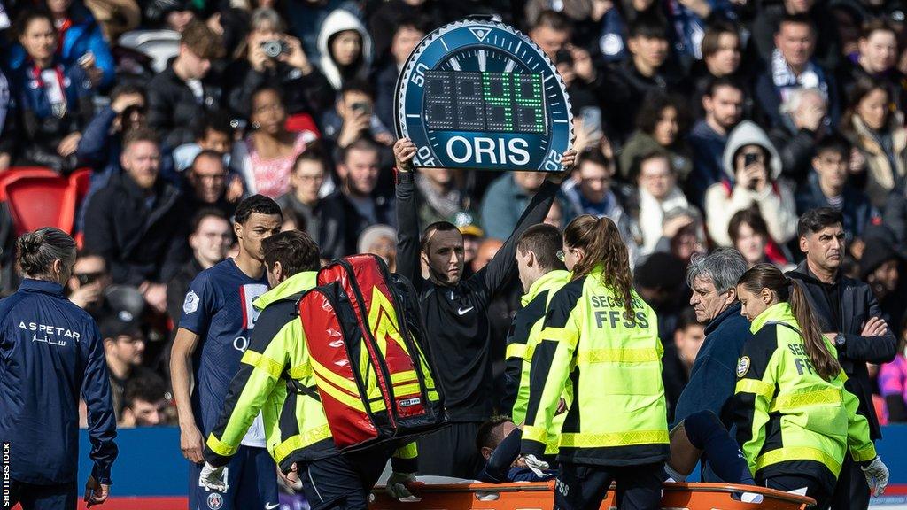 Neymar is taken off on a stretcher with an ankle injury as Ligue 1 leaders PSG beat Lille in February