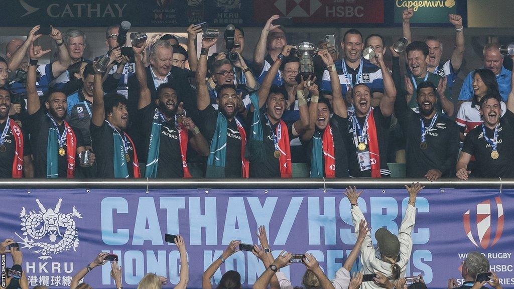 New Zealand men's sevens team celebrate winning in Hong Kong