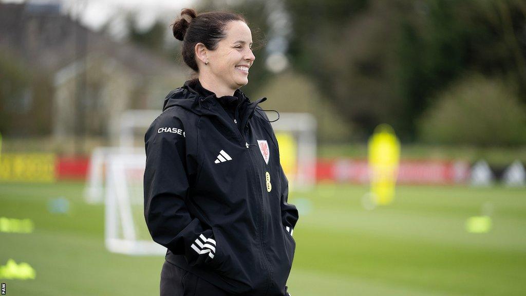 Wales boss Rhian Wilkinson smiles during a training sesssion