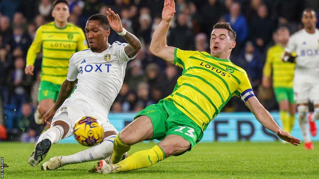 Kenny McLean blocks a shot by Jaidon Anthony during the game against Leeds at Elland Road