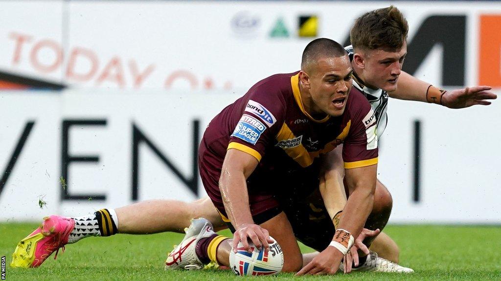 Tui Lolohea scores Huddersfield Giants' second try in their Super League victory over Hull FC