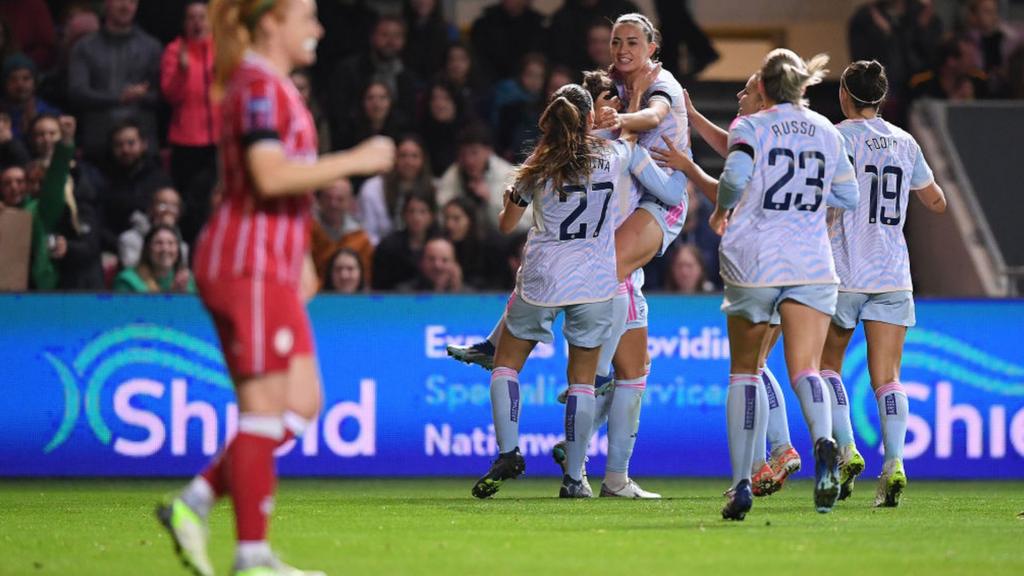 Katie McCabe celebrates her second goal with team-mates