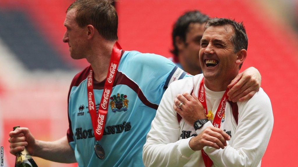 Owen Coyle (right) celebrates promotion with Burnley in 2009