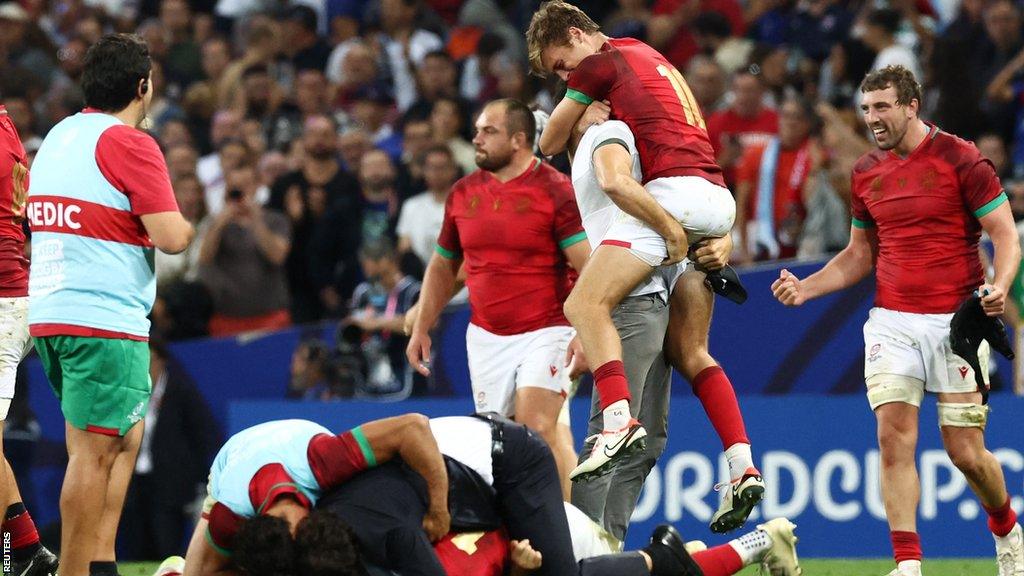 Portugal celebrate their Rugby World Cup victory over Fiji