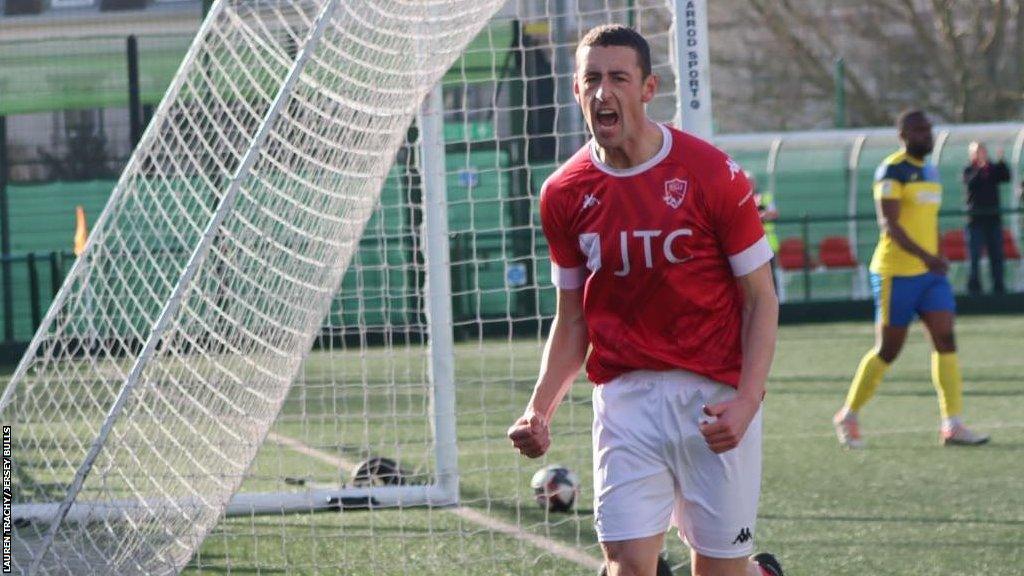 Adam Trotter celebrates