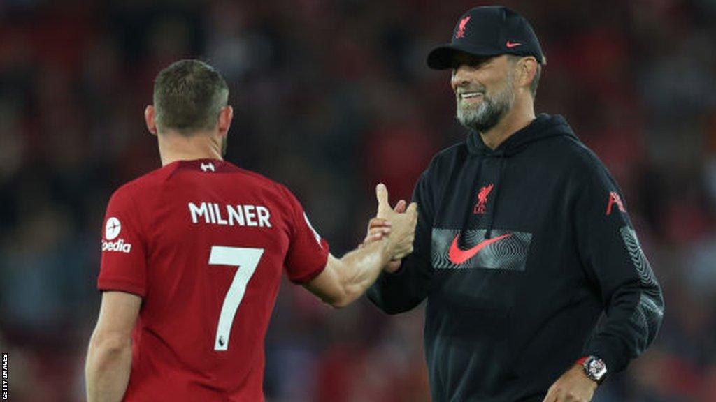 Jurgen Klopp embraces James Milner