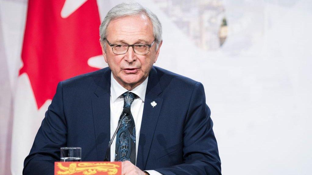 New Brunswick's premier Blaine Higgs looks on as prime ministers of the Canadian provinces gather during a meeting set-up by Canada prime minister Justin Trudeau in Montreal, on December 7, 2018