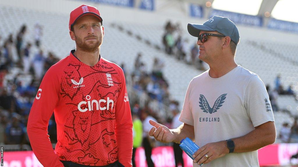 England limited-overs captain Jos Buttler speaks to coach Matthew Mott