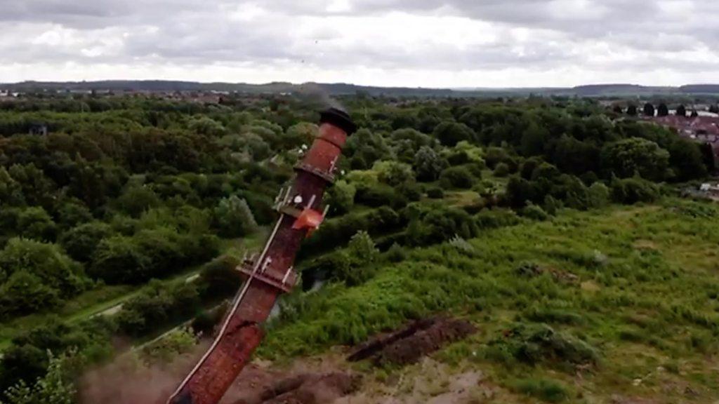 The demolition of the mill chimney