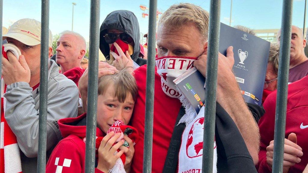 Liverpool fans queueing outside the Stade de France