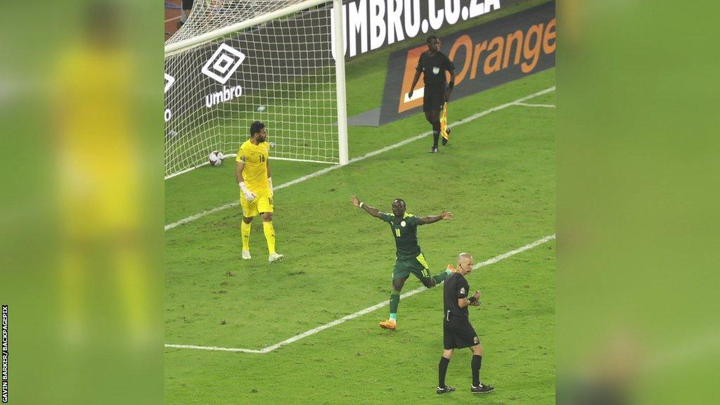 Sadio Mane celebrates his penalty shoot-out goal that earned Senegal their first Africa Cup of Nations triumph, winning the 2021 edition