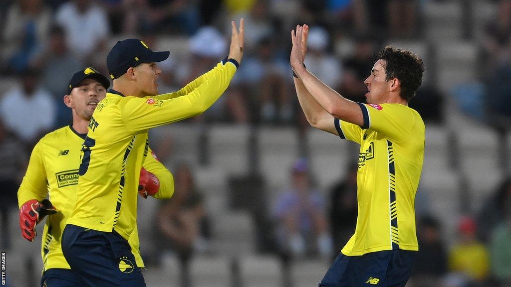 Toby Albert and John Turner celebrate a Hampshire Hawks wicket