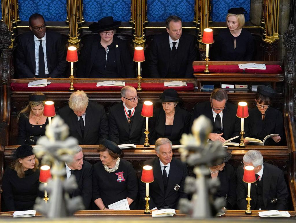 Chancellor of the Exchequer Kwasi Kwarteng, Deputy Prime Minister Dr Therese Coffey, Hugh O'Leary, Prime Minister Liz Truss, (middle row left to right) Carrie Johnson, Boris Johnson, Philip May, Theresa May, David Cameron, Samantha Cameron, (bottom row left to right) Sarah Brown, Gordon Brown, Cherie Blair, Sir Tony Blair, Lady Norma Major and Sir John Major, attending the State Funeral of Queen Elizabeth II, held at Westminster Abbey