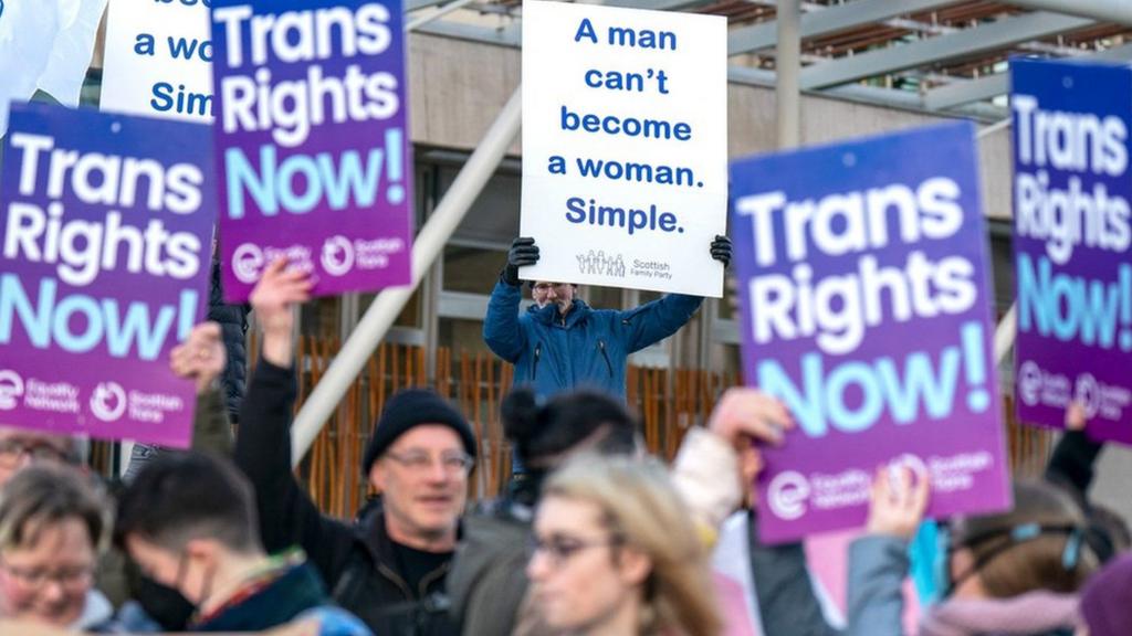 Supporters and opponents of the bill outside the Scottish parliament