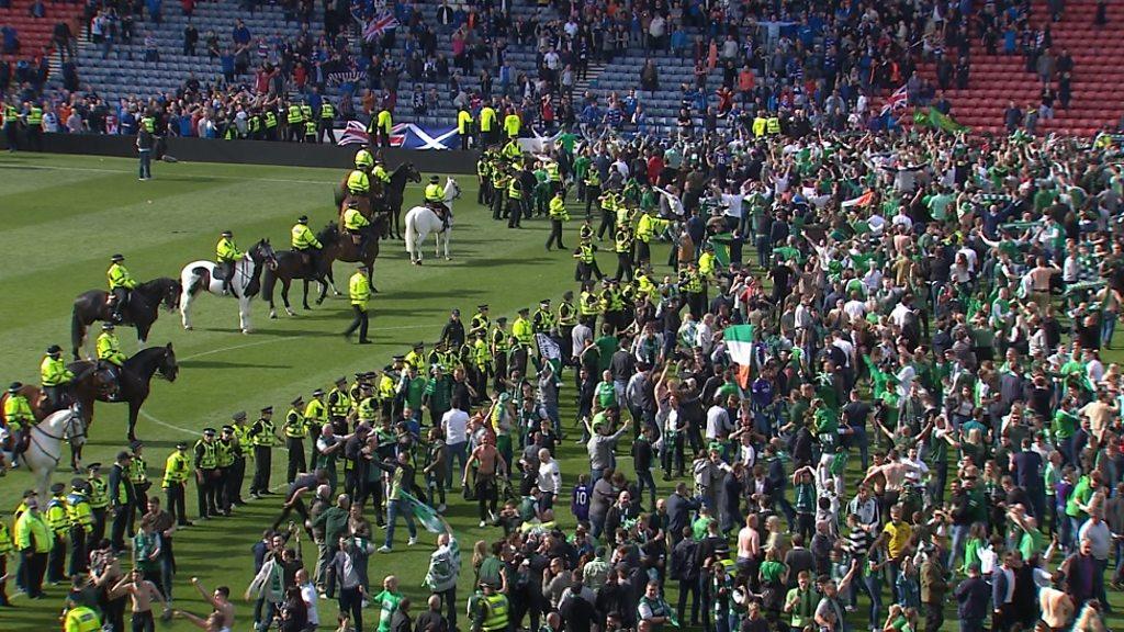 Fans and police in Hampden Park