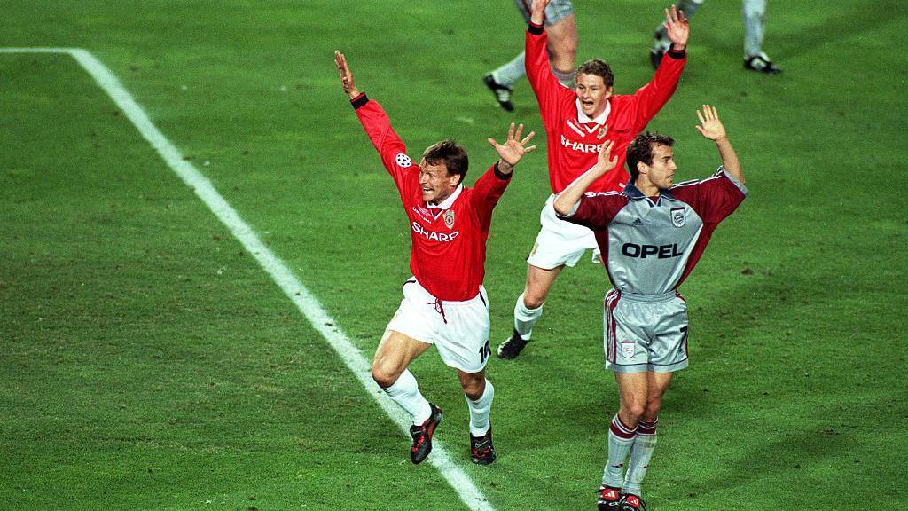 Teddy Sheringham celebrates