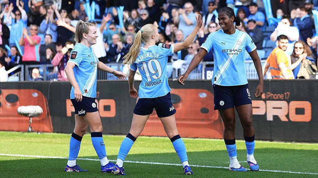 Khadija Shaw celebrates