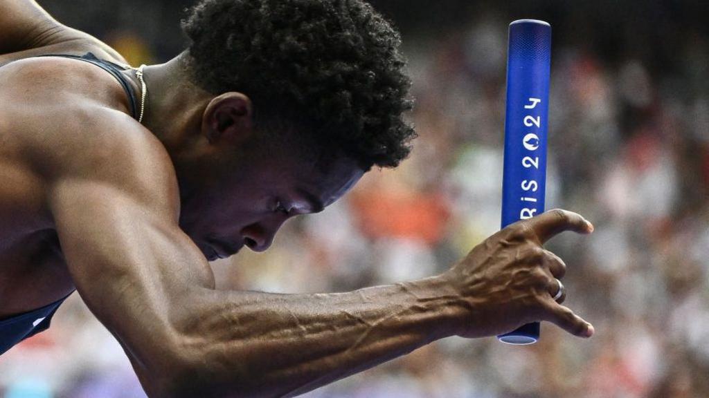 Jeremiah Azu with relay baton