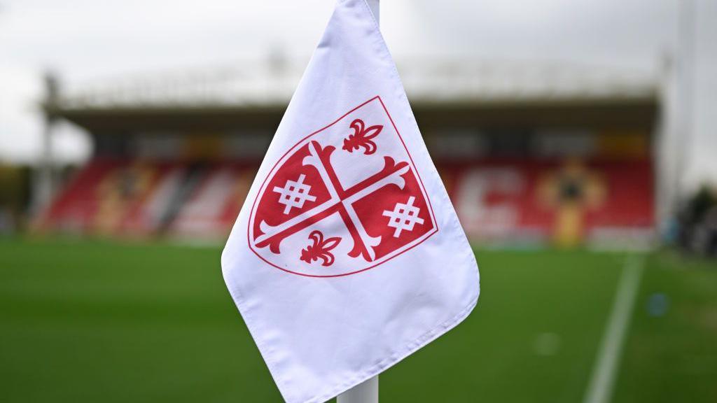 A detailed view of a corner flag prior to the Emirates FA Cup First Round match between Woking and Cambridge Utd at Kingfield Stadium