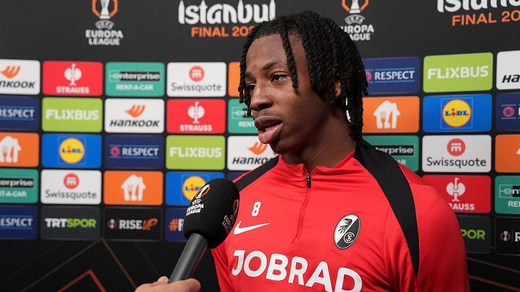 Johan Manzambi of Freiburg speaks to the media 
