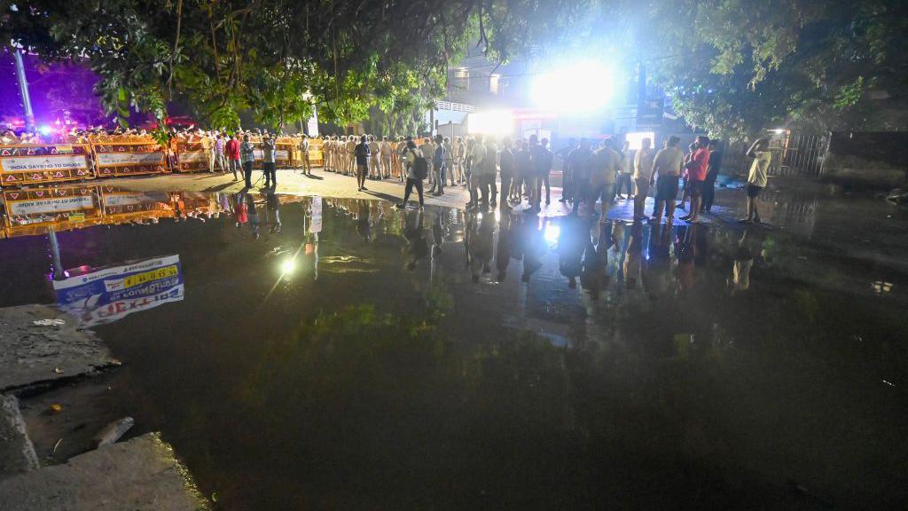 NEW DELHI, INDIA - JULY 28: A view of a flooded street outside Rau' IAS study circle in old Rajendra Nagar where students were allegedly drowned to death after the basement of the building was flooded following heavy rain on July 28, 2024 in New Delhi, India. Delhi's IAS coaching center on Saturday became flooded following heavy rainfall and claimed the life of three UPSC aspirants trapped in the basement. The incident occurred after a nearby drain burst open causing a deluge in the basement of the popular coaching centre in Central Delhi. UPSC aspirants held a night-long protest, demanding immediate action from the authorities following the incident at the coaching institute. (Photo by Sanchit Khanna/Hindustan Times via Getty Images)