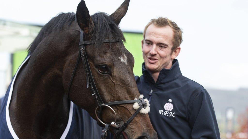 Keagan Kirkby with a horse post-race