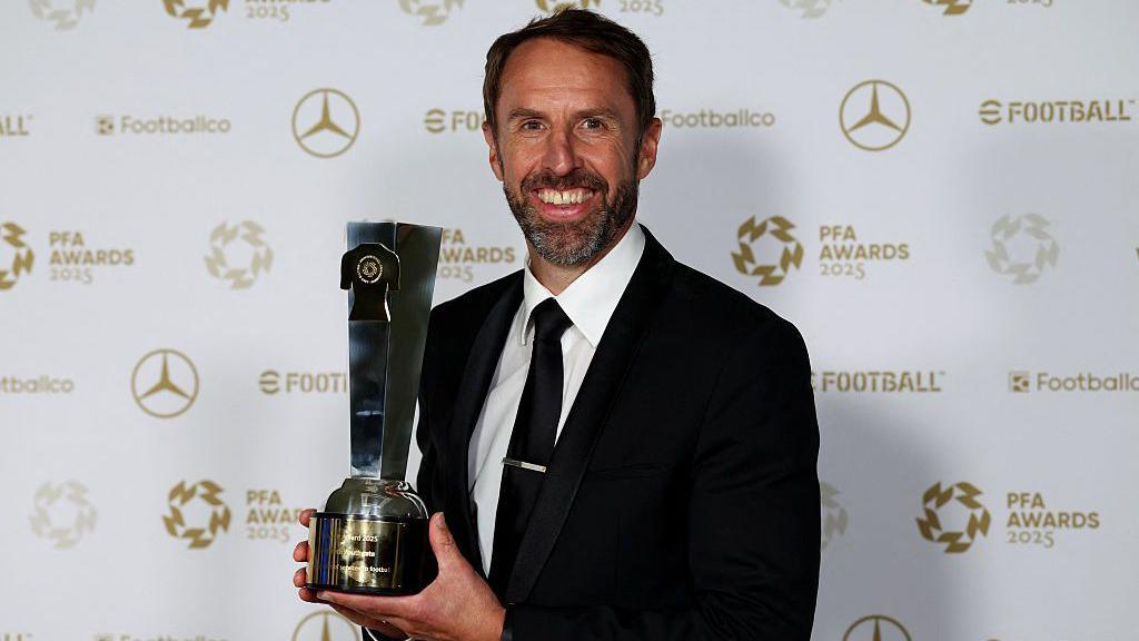 Gareth Southgate holds his PFA Merit Award