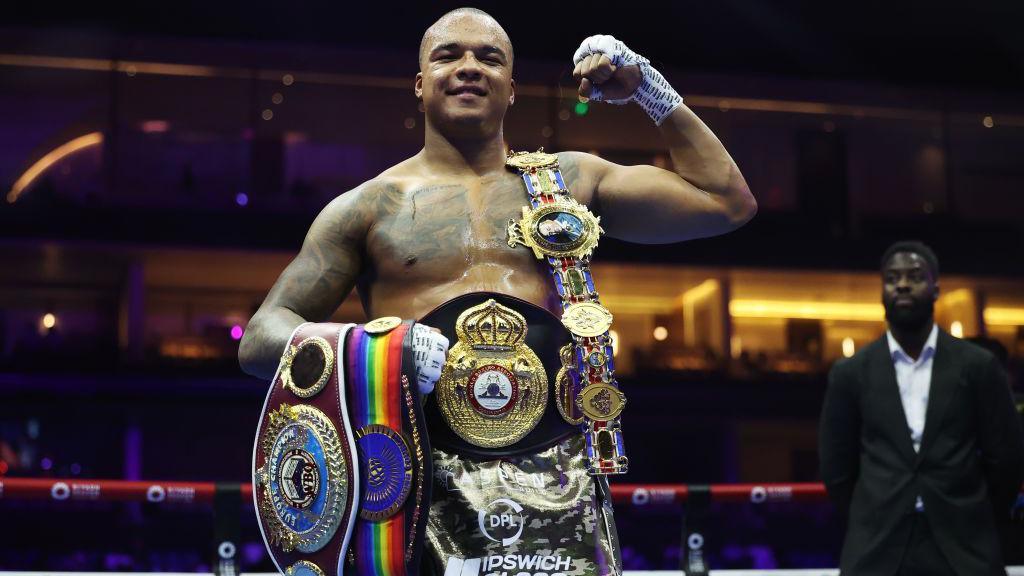 Fabio Wardley poses for a photo with his belts as he celebrates victory over Frazer Clarke in Saudi Arabia