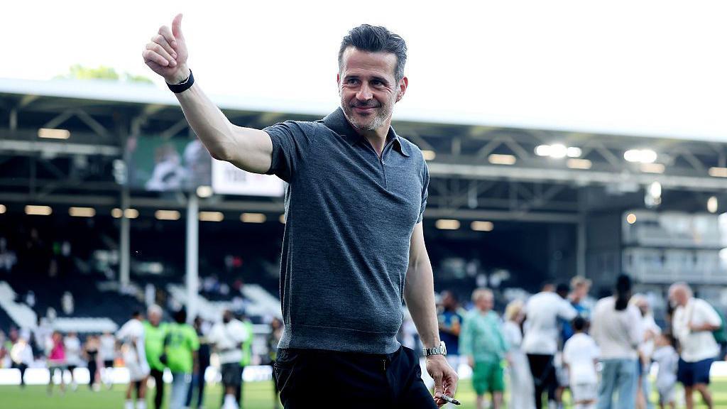 Marco Silva waves towards the supporters