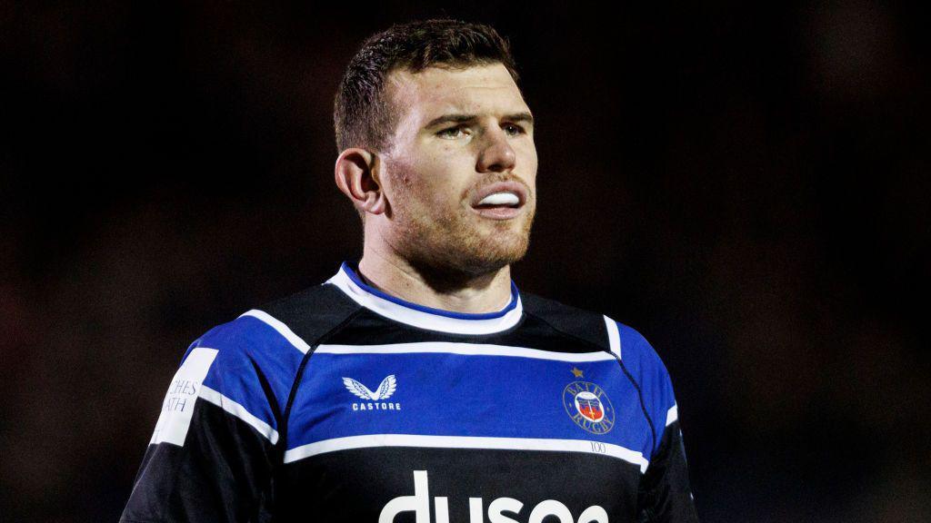 Ben Spencer standing on the pitch during a game