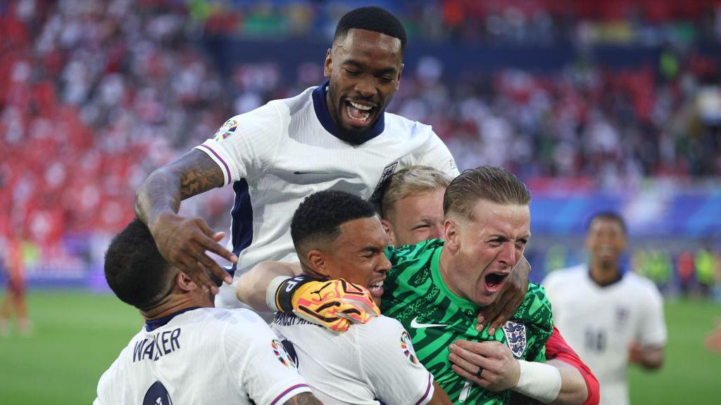 England team celebrate their quarter-final win 