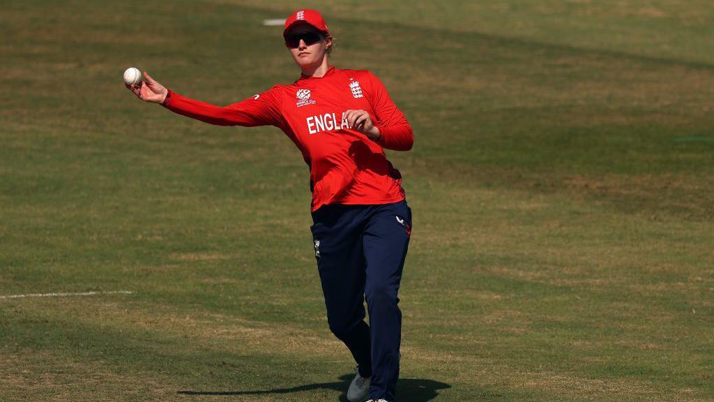 Charlie Dean fields during the ICC Women's T20 World Cup 2024 match between England and Scotland at Sharjah Cricket Stadium